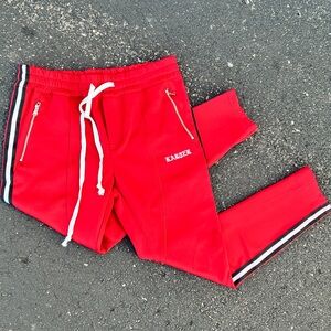 NWT Karter Collection men’s red track pants with black and white side stripes